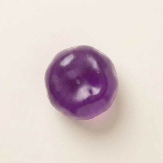 Crystal purple grape squishy stress ball with ultra-soft zero-rebound texture, translucent purple finish, and non-sticky surface.