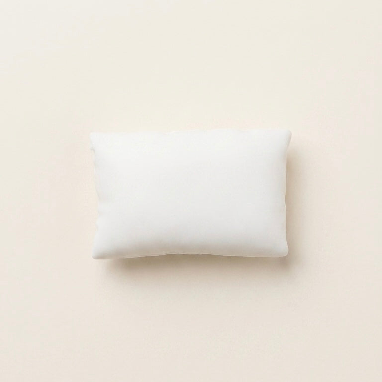 Ultra-soft sticky pillow TABA squishy sensory toy with a soft white cushion shape for bare-hand or bag play.