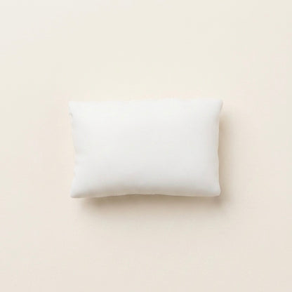 Ultra-soft sticky pillow TABA squishy sensory toy with a soft white cushion shape for bare-hand or bag play.