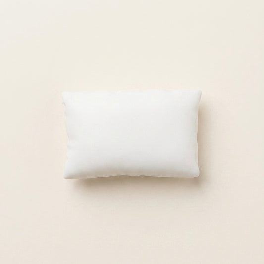 Ultra-soft sticky pillow TABA squishy sensory toy with a soft white cushion shape for bare-hand or bag play.