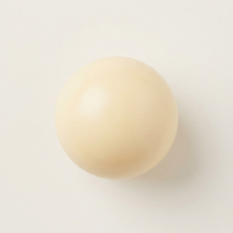 Pearl Cheese squishy stress ball with soft cream-based filling, rounded pearl texture, low stickiness, and an easy chewy squeeze.