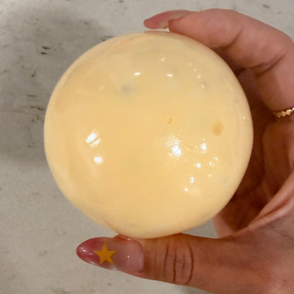 Handheld Pearl Cheese squishy stress ball with soft cream-based filling, smooth pearl texture, low stickiness, and an easy chewy squeeze.