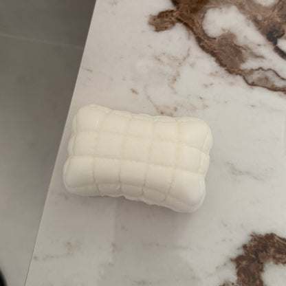 Ultra-soft sticky Mellow Pillow TABA squishy sensory toy with a white quilted cushion design for bare-hand or bag play.
