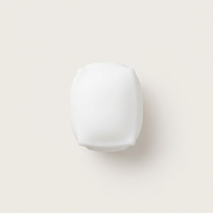 Ultra-fluffy Cloud Tofu squishy stress cube with soft airy texture, matte non-sticky surface, and gentle bounce-back.