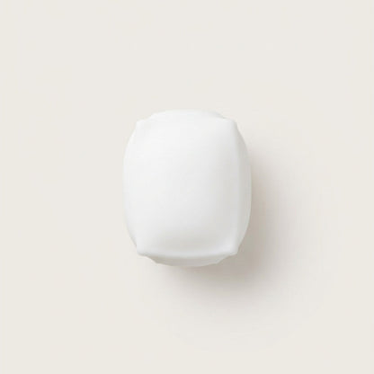 Ultra-fluffy Cloud Tofu squishy stress cube with soft airy texture, matte non-sticky surface, and gentle bounce-back.